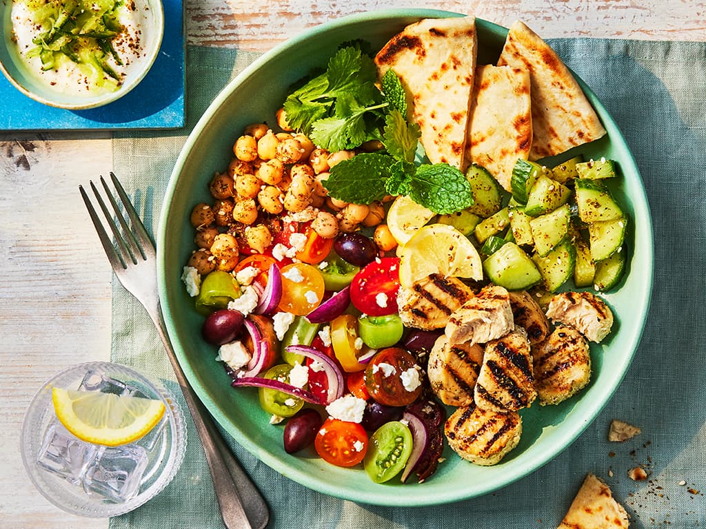 Colorful salad bowl with grilled vegetables showcasing ultra-processed foods information